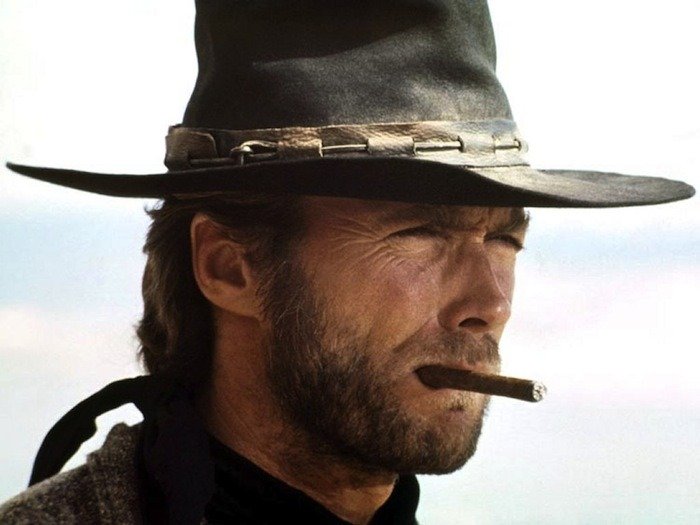 Clint Eastwood smoking a cigar 